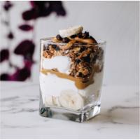 Peanut Butter Chocolate Banana · Yogurt, peanut butter drizzle, chocolate chips and banana layered perfectly with house-made ...