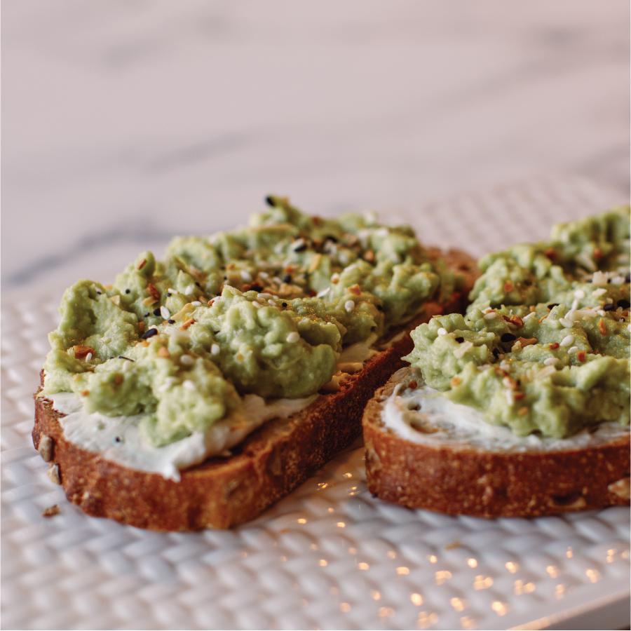 Avocado Toast · Open-faced sunflower toast with avocado and cream cheese topped with everything-bagel seasoning