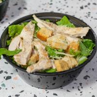 Caesar Salad and chicken · Romaine Lettuce, Grilled Chicken, Croutons, Bacon, Parmesan Cheese, Cesar Dressing.
