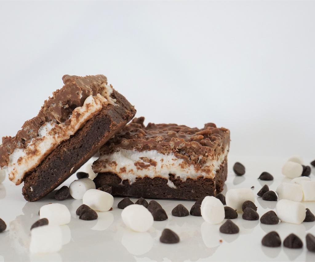 Krispy Peanut Butter Marshmallow Brownie · Layers: Crisp rice cereal, peanut butter milk chocolate glaze and marshmallows. Base: Chocolate brownie.