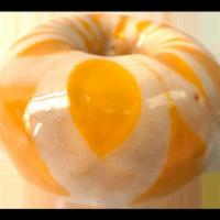 Umpa Lumpa Wet Dreamcicle · Orange glaze blanketed by cream cheese. 
