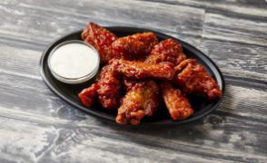 B-B-Q Wings · Fried chicken wings sauteed with BBQ sauce. (8 pcs)