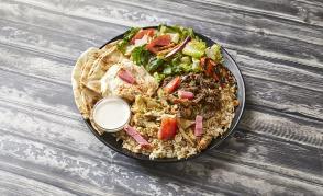 Shawarma Combo · Shredded chicken shawarma and lamb shawarma, comes with hommous, rice or fries, and soup or ...