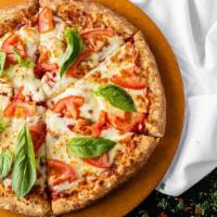 Margarita Pizza · Traditional hand tossed pizza. Homemade tomato sauce, mozzarella cheese, fresh tomatoes and ...