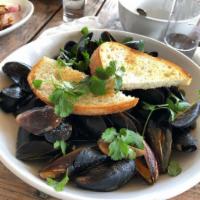 Pei Mussels · Select: white wine with shallots, garlic and parsley or spicy marinara sauce.