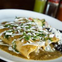 Poblanos Enchiladas · Tender pulled chicken with Oaxaca cheese, spinach and mushrooms.
Topped with a creamy roast...