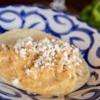 Barrio Pollo Taco · Spice-rubbed chicken, caramelized onions and roasted poblano peppers in a subtly spicy cream...