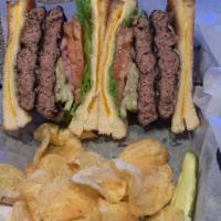 5 Grilled Cheese Burger · Cheese topped burger between 2 grilled cheese sandwiches with 5 different cheeses.
