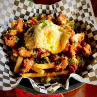 Chef Ben's Hangover Fries · French fries, crispy chicken tenders, nacho cheese, buffalo, ranch, bacon, scallions, two fr...