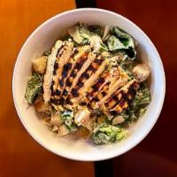 Dunning Classic Chicken Caesar Salad · House-made dressing, croutons, shaved Parmesan and marinated chicken breast.