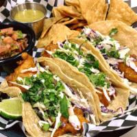 Street Tacos · 3 tacos on traditional corn tortillas with choice of protein, homemade tortilla chips, salsa...