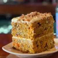 Carrot Cake · Old-fashioned, made from scratch. Topped with cream cheese icing and chopped pecans. Contain...