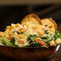 Caesar Salad · Aged Parmesan, romaine lettuce, Roma tomato and croutons. House made Caesar dressing. Served...