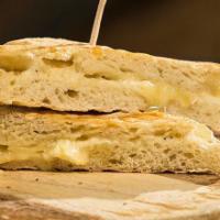 Grilled Cheese Panini · Swiss, white cheddar and Saint Andre triple cream Brie. Served with kettle chips or our own ...