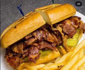 Pastrami Sandwich Combo · French roll, mustard, pickle. Served with fries and soda.