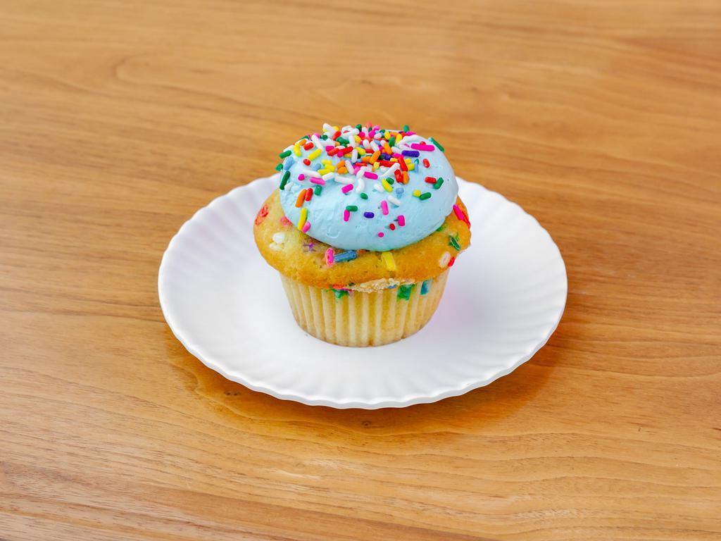 Cake Batter Cupcake · Vanilla funfetti cake filled with cake batter topped with buttercream frosting and sprinkles.