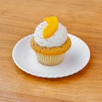 Peach Cobbler Cupcake · A cupcake wars winner! Vanilla brown sugar streusel cake filled with a cinnamon peach puree,...