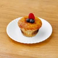 Creme Brulee Cupcake · Vanilla cake filled with a classic creme brulee custard topped with burnt sugar and fresh be...
