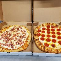 Everyday Special: 2 Large One Topping Pizzas · 2 Delicious One Topping Pizzas for only $17.99

Each pizza comes with:
Your choice of crust
...