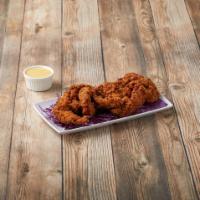 Chicken Tenders · Crispy, all white meat chicken strips served with BBQ, ranch and honey mustard dipping sauces.