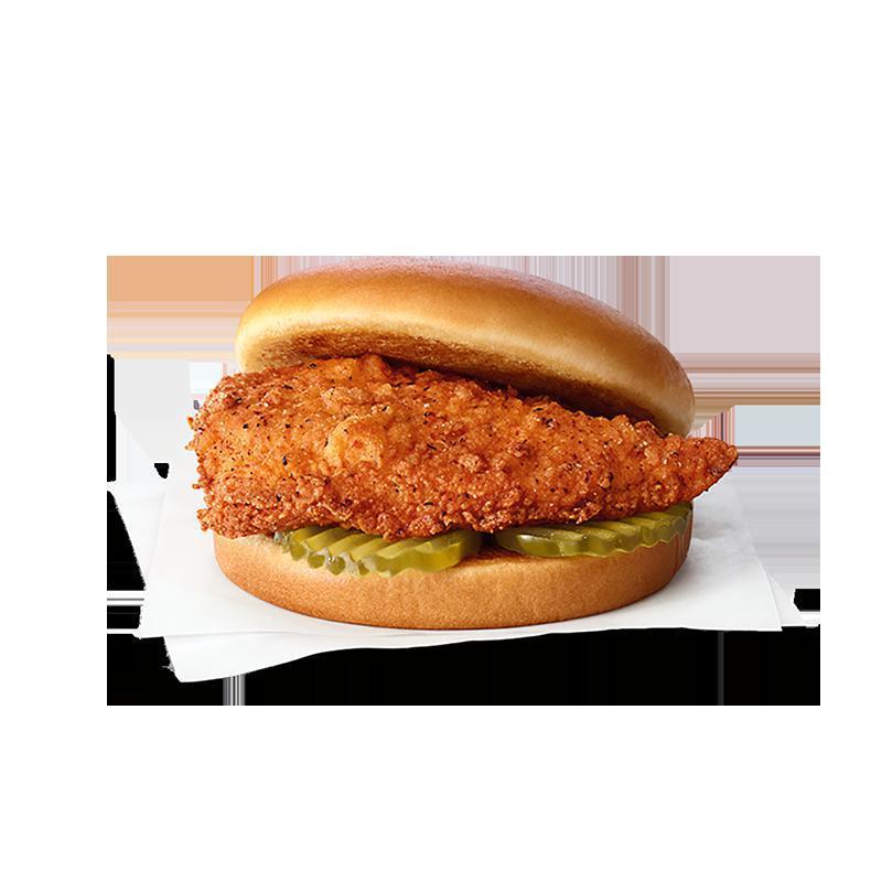 Spicy Chicken Sandwich · A boneless breast of chicken seasoned with a spicy blend of peppers, freshly breaded, pressure cooked in 100% refined peanut oil and served on a toasted, buttered bun with dill pickle chips. Also available on a multigrain bun. 