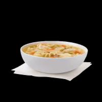 Chicken Noodle Soup · Shredded Chick-fil-A® chicken breast, chopped carrots and celery with egg noodles in a heart...