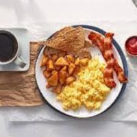 Two Egg Breakfast · Cage free eggs, choice of apple-wood smoked bacon or breakfast sausage with breakfast potato...