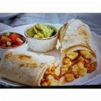 Breakfast Burrito · Cage free scrambled eggs, applewood smoked bacon, caramelized onions, breakfast potatoes, ch...