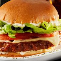 Bistro Burger · Half pound burger, white cheddar cheese, lettuce, tomato, garlic aioli on a brioche roll, wi...