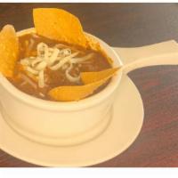 Chili · Our house-made chili served with grated cheddar and crispy tortillas.