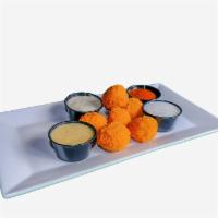 Buffalo Chicken Bleu Cheese Popper · Breaded crust with tasty gooey buffalo sauce, bleu cheese and chicken in the center. Yummy! 