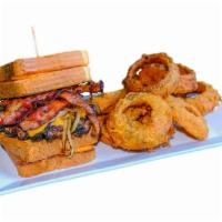 Duffy's Famous Monster Burger · Huge fresh, never frozen, Angus burger cooked between 2 grilled cheese sandwiches with lettu...