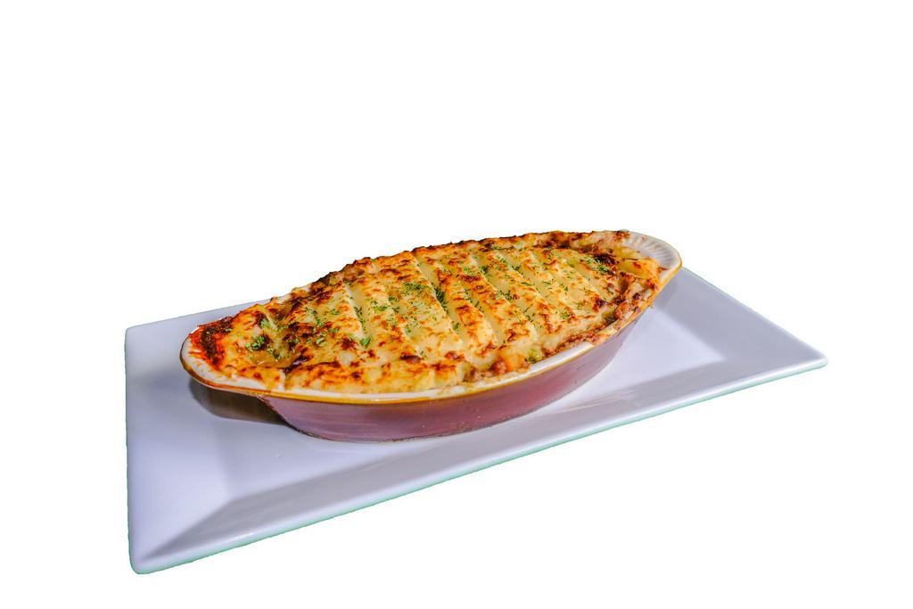 House Made Shepherd's Pie · Duffy's own recipe with fresh ground beef, onion, peas, carrots and topped with mashed potatoes.