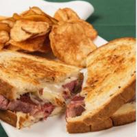 Corned Beef and Swiss Sandwich · Slow cooked for 8 hours, thick cut corned beef and Swiss on rye.