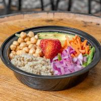 Buddha Bowl · Mixed greens, legumes, quinoa, shredded carrots, red onion, fruit, and avocado. Vegan.