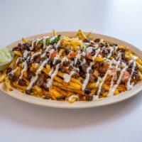 Asada Fries · Served with mix shredded cheese, sour cream, pico de gallo and guacamole.