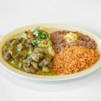 Pork Green Plate · Served with rice, beans, lettuce and pico de gallo. Freshly made corn tortillas 3 pieces.