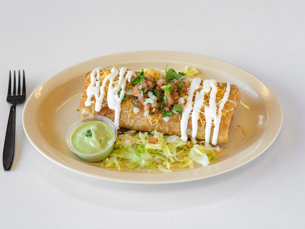 Pastor Chimichanga · Served with guacamole, sour cream and cheddar cheese.