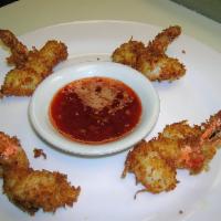 Coconut Shrimp · In a sweet chili sauce.