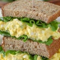 Egg Salad Sandwich Lunch · A cold creamy sandwich made with chopped eggs, mayo, and seasoning.  Chopped eggs that have ...