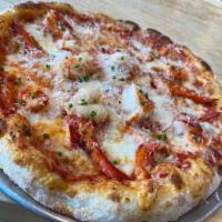 Lobster Pizza · Tomato sauce, Maine lobster, drawn butter, mozzarella