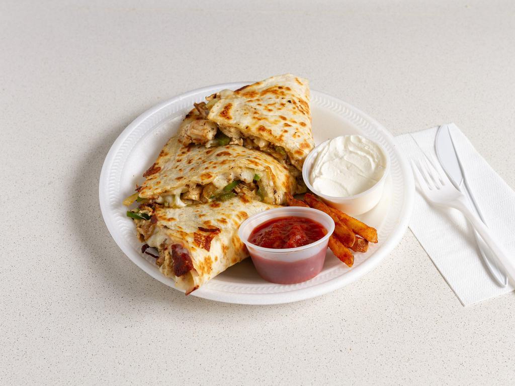 Quesadilla · Grilled green peppers and onions with mozzarella cheese or any other kind of cheese.