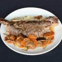 Short Ribs · Seared, braised, seasoned and served with leeks, carrots, mushrooms and mashed potatoes.