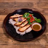 CM5. Com Ga Nuong · Seasoned char-grilled chicken breast served with a small vinaigrette lettuce and tomato sala...