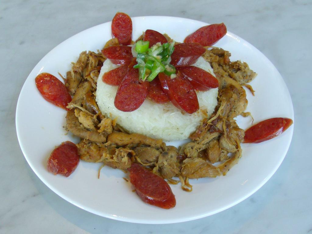 BC3. Xoi Ga Lap Xuong · A steamed sweet sticky rice dish topped with scrumptious stir-fried shredded chicken and Oriental style sausage slices.