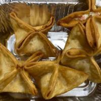 Crab Rangoon · 5 pieces. Fried wonton wrapper filled with crab and cream cheese.