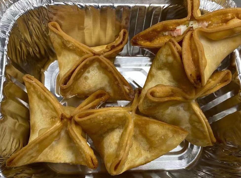 Crab Rangoon · 5 pieces. Fried wonton wrapper filled with crab and cream cheese.