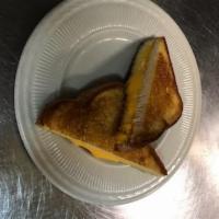 Grilled Cheese · Three pieces of American Cheese melted on white bread. Served with potato chips.
