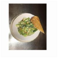 Caeser Salad · Romaine lettuce topped with Caeser dressing, Parmesan cheese and croutons. Served with Garli...