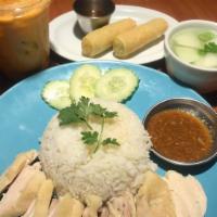 Kao Mun Kai · Special cooked chicken over ginger rice, served with Thai special spicy sauce